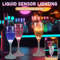 Colored Lights Up Champagne Flutes Glasses