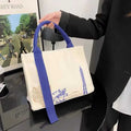 Canvas Bag With Ribbon Design