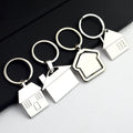 Metal Rotating House Keychain