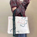 Canvas Bag With Ribbon Design