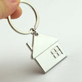 Metal Rotating House Keychain